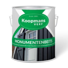 Zwarte Koopmans Monumentenbeits op houten gevel van monumentale schuur